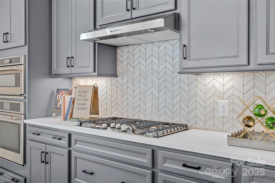 Gas cooktop and stylish design.