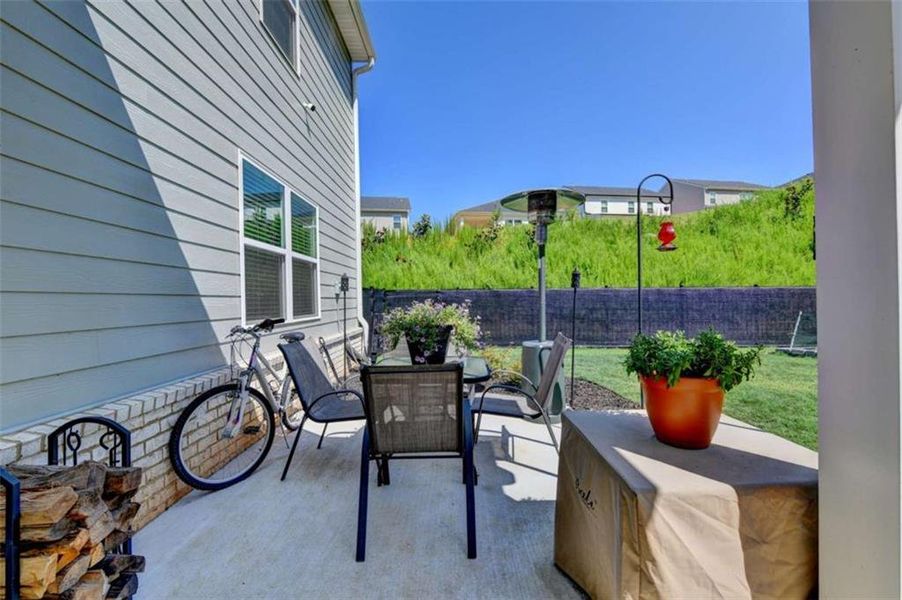 Exterior details and patio area of a home in Twin Lakes, Hoschton (Image 28).
