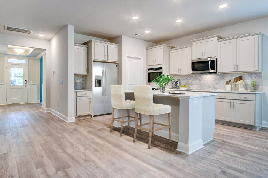 Representative furnished interior of a home built from the Winston by McKee Homes in Coventry Woods, Fayetteville (Image 12).