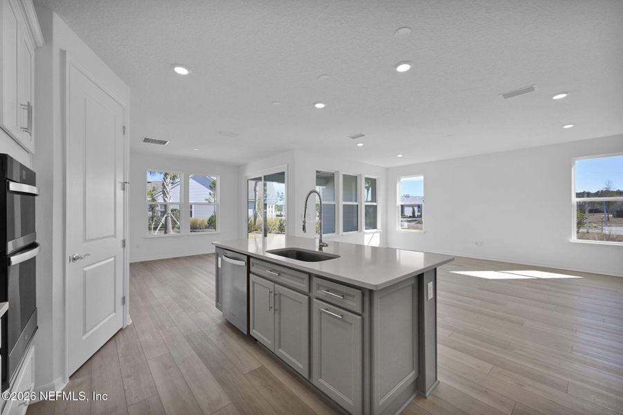Furnished interior view inside a new home in Del Webb Wildlight, Yulee (Image 7).