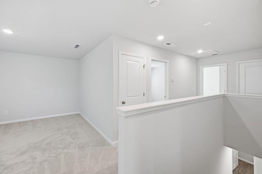 Spacious, unfurnished interior of a new home in Carpenter Falls, Durham (Image 25).