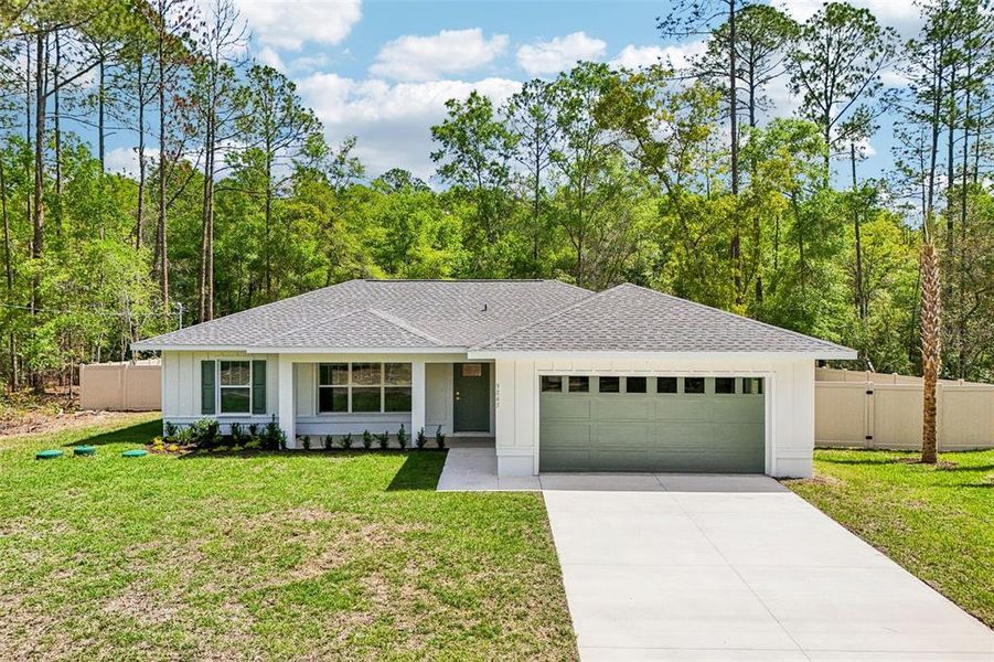Front exterior of a new home in , Citrus Springs, FL, highlighting curb appeal (Image 28).
