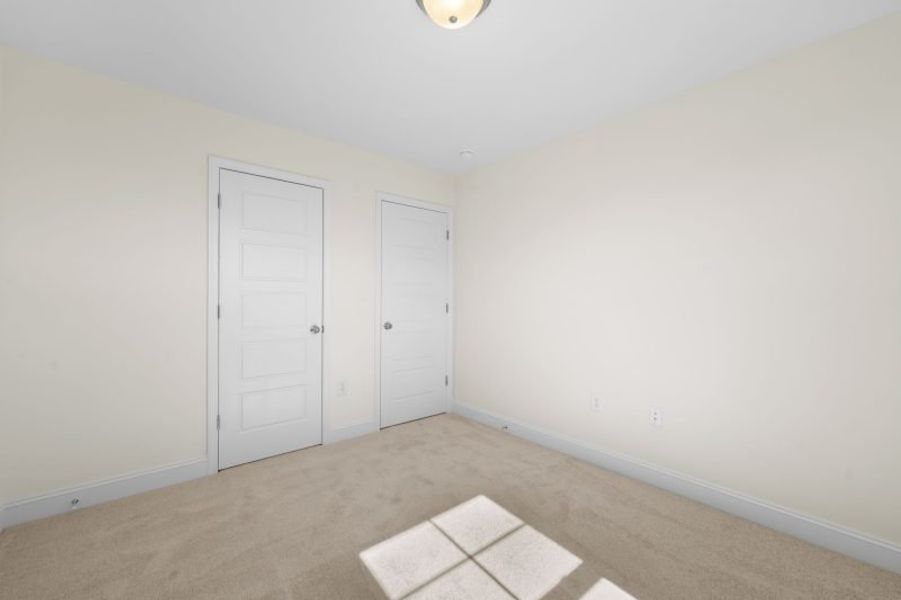Spacious, unfurnished interior of a new home in Miller's Reserve, Winston-Salem (Image 65).