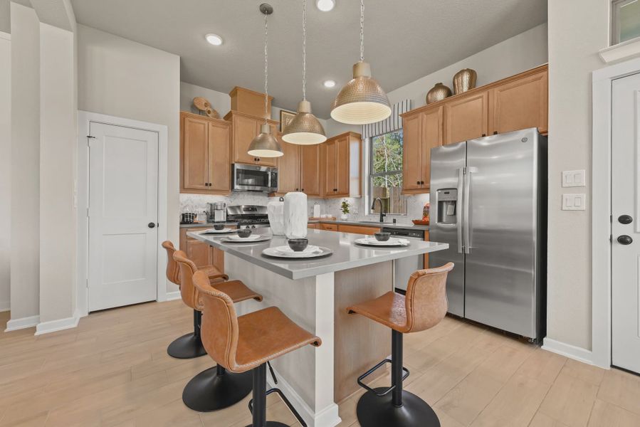 Representative furnished interior of a home built from the Chantilly 2 by Chesmar Homes in Sienna Chateau, Missouri City (Image 16).