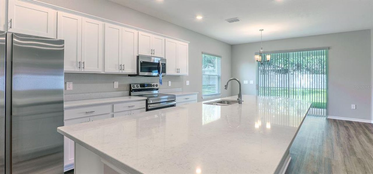 Furnished interior view inside a new home in Otter Woods Estates, Auburndale (Image 5).