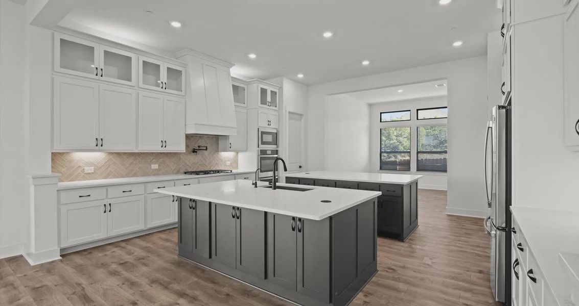 Representative furnished interior of a home built from the Allison by Chesmar Homes in Sweetwater, Austin (Image 5).