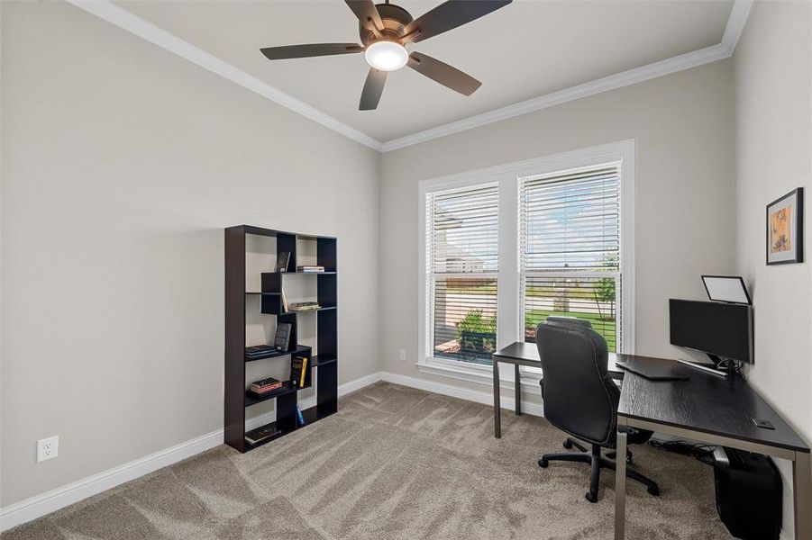 Versatile front bedroom with ceiling fan and lots of natural light, easily used as a home office. Versatile front bedroom with ceiling fan and lots of natural light, easily used as a home office.
