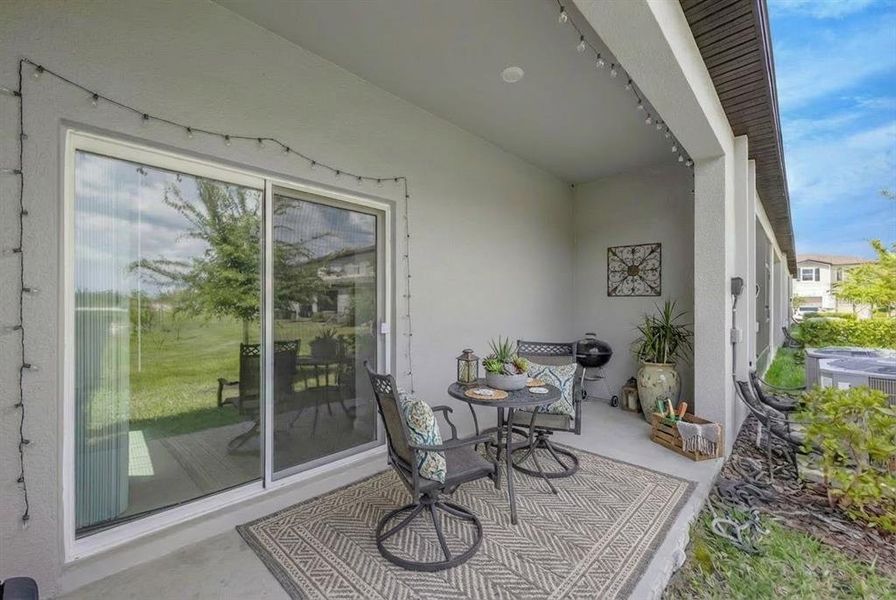 Exterior details and patio area of a home in Townes at Southshore Pointe, Ruskin (Image 4).