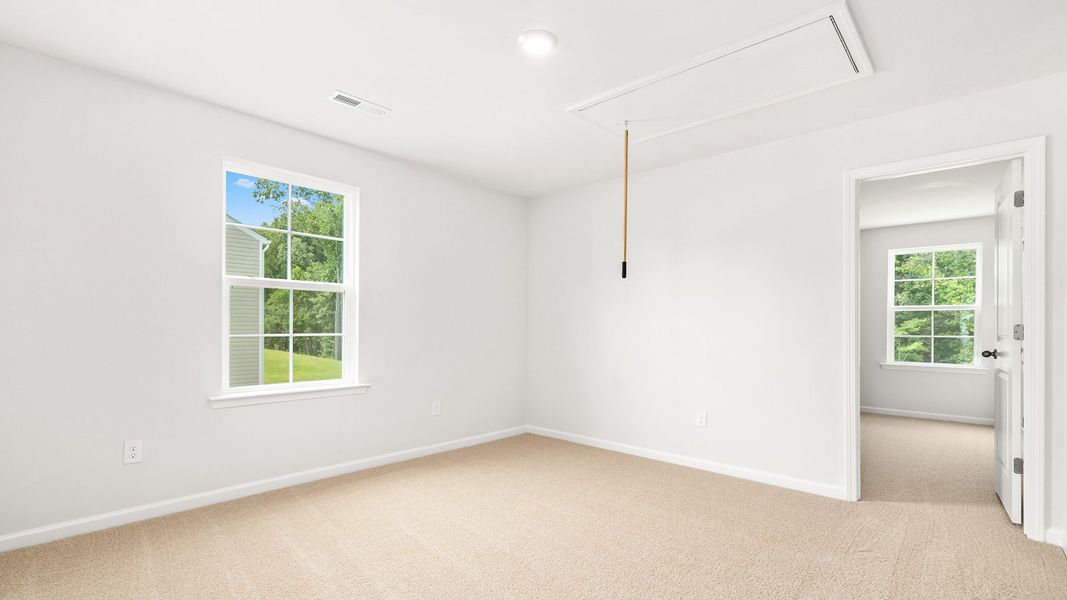 Spacious, unfurnished interior of a new home in Greystone North, Stoneville (Image 16).