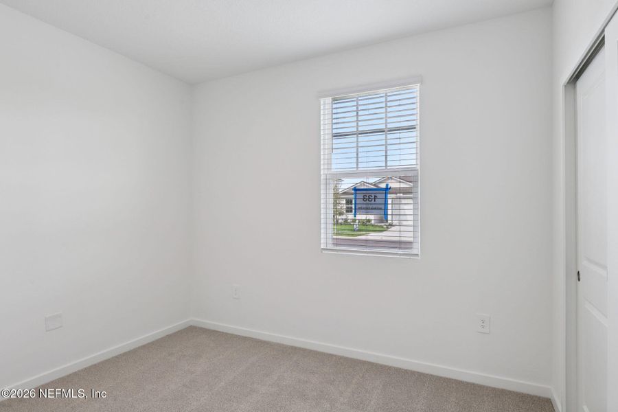 Spacious, unfurnished interior of a new home in Colbert Landings, Palm Coast (Image 27).