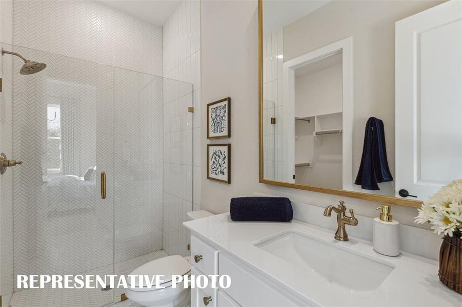 Guests will feel right at home in any of the beautifully finished secondary baths in this fantastic home!  REPRESENTATIVE PHOTO