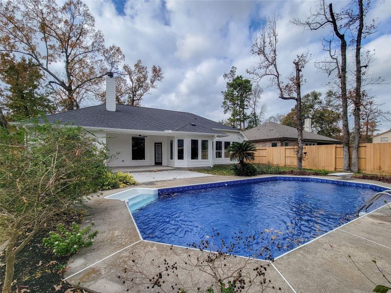 Exterior details and patio area of a home in , Conroe (Image 3).