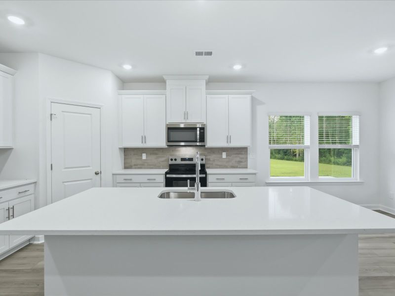 Furnished interior view inside a new home in Palmetto Place, Longs (Image 6).