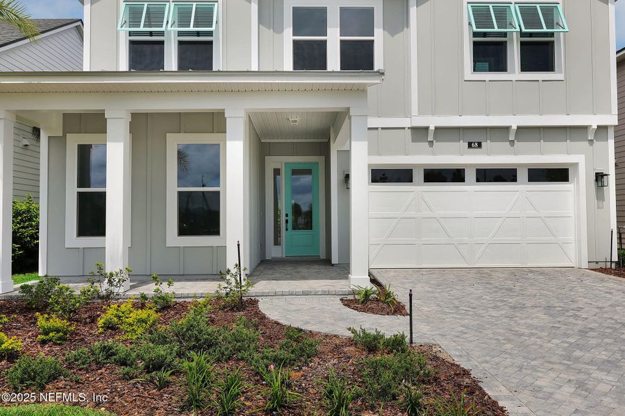 Front exterior of a new home in Seabrook Village at Seabrook, Ponte Vedra, FL, highlighting curb appeal (Image 25).