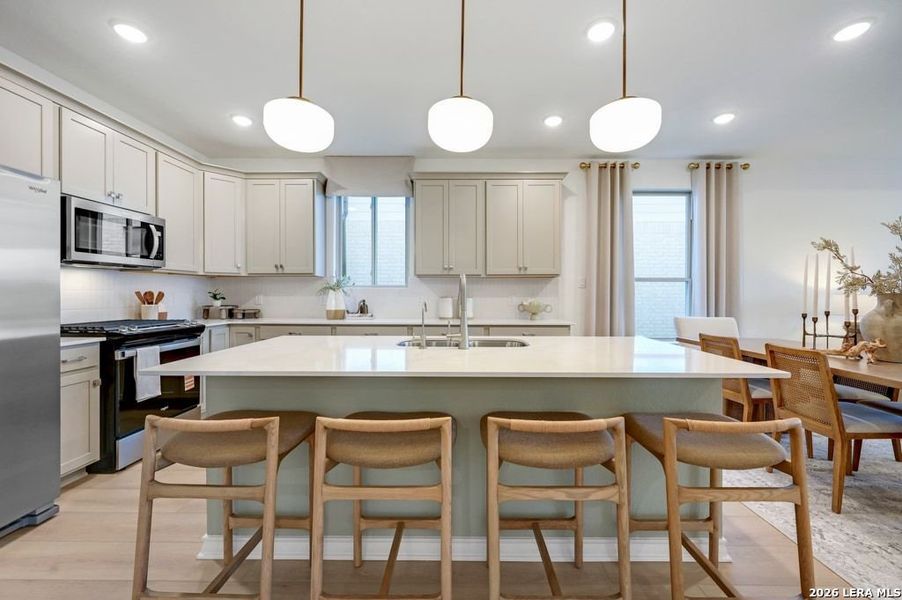 Furnished interior view inside a new home in Nopal Valley, San Antonio (Image 13).