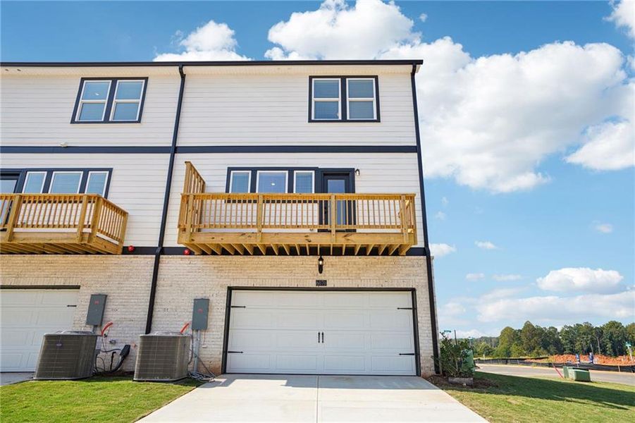Exterior details and patio area of a home in Hemingway - Highland Series, Cumming (Image 3).
