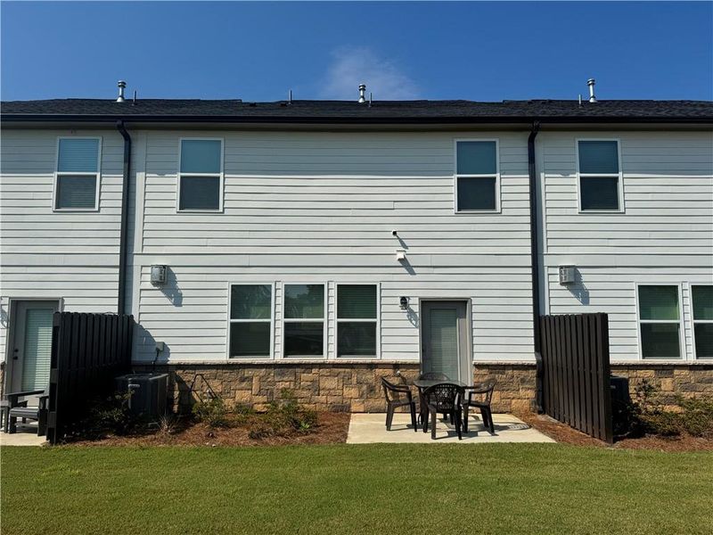 Front exterior of a new home in , Duluth, GA, highlighting curb appeal (Image 23). Front exterior of a new home in , Duluth, GA, highlighting curb appeal (Image 23).