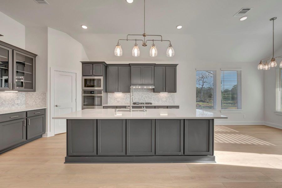 Furnished interior view inside a new home in The Oaks on 6th Street, Magnolia (Image 11).