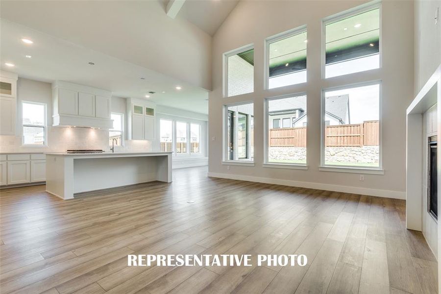 Spacious and light filled, this family room is large enough for the entire family!  REPRESENTATIVE PHOTO.