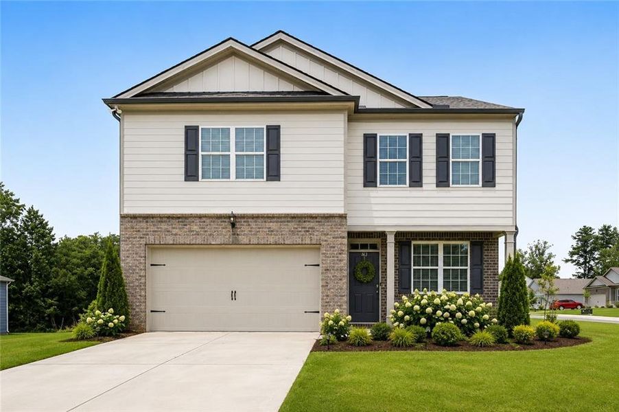Front exterior of a new home in Oakwood, Dallas, GA, highlighting curb appeal (Image 30). Front exterior of a new home in Oakwood, Dallas, GA, highlighting curb appeal (Image 30).