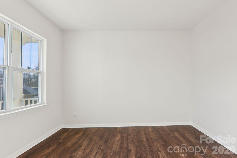 Spacious, unfurnished interior of a new home in Rydele Heights, Asheville (Image 22).