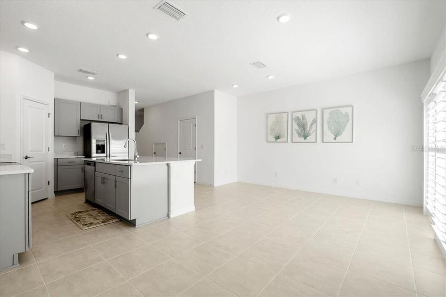 Furnished interior in a model home at The Townhomes at Azario Lakewood Ranch in Bradenton (Image 13).