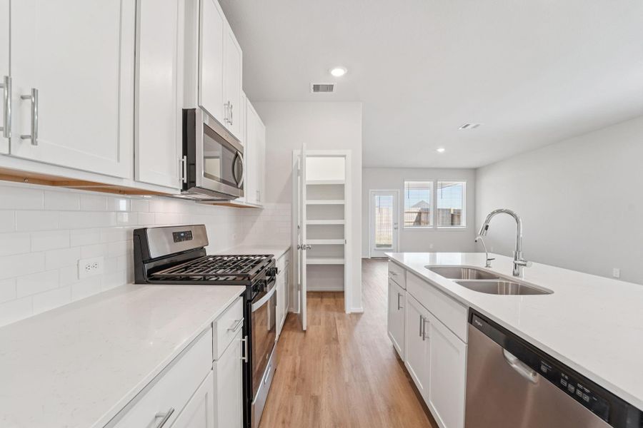 Photo is not of the actual home, but is an inspirational photo of builder’s model home and may depict options, furnishings, and/or decorator features that are not included