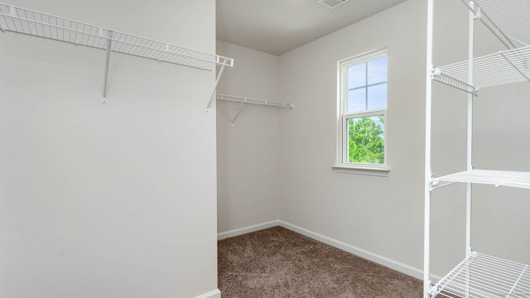 Spacious, unfurnished interior of a new home in Indigo Preserve, Leland (Image 26).