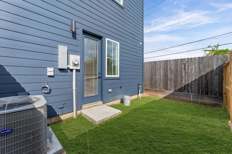 The spacious backyard, accessible directly from the first-floor secondary bedroom, offers a private retreat with the added convenience of separate street access. Perfect for entertaining, relaxing, or enjoying outdoor activities, this versatile space provides both comfort and privacy in a highly functional layout.