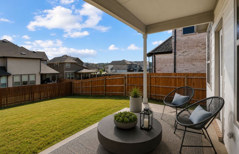 Exterior details and patio area of a home in Saddleback at Santa Rita Ranch, Liberty Hill (Image 37). Exterior details and patio area of a home in Saddleback at Santa Rita Ranch, Liberty Hill (Image 37).