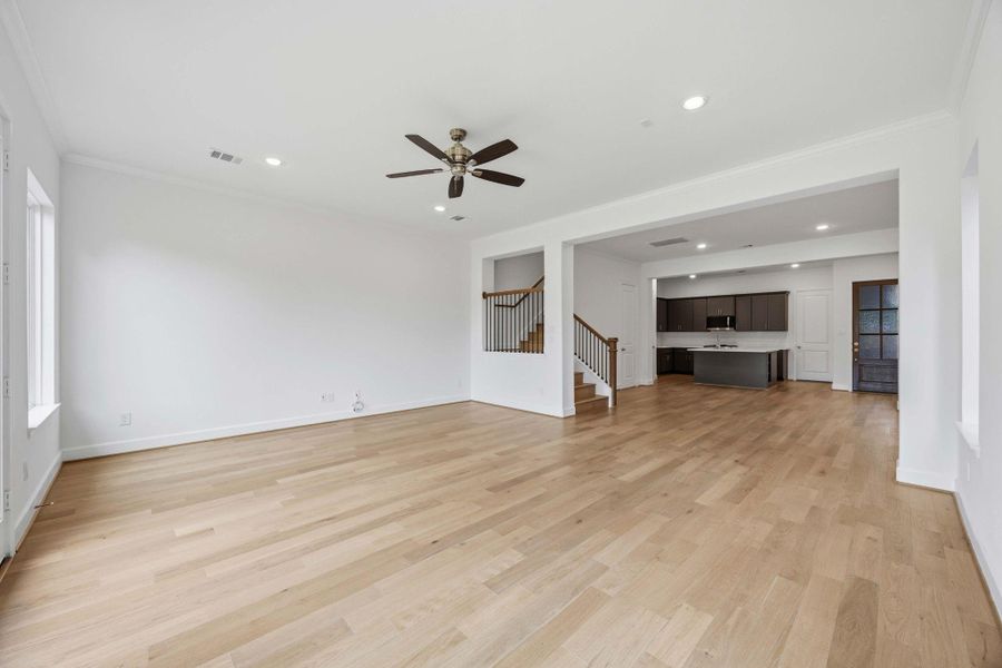 Design your ideal living space with room for multiple furniture groupings in this expansive area.