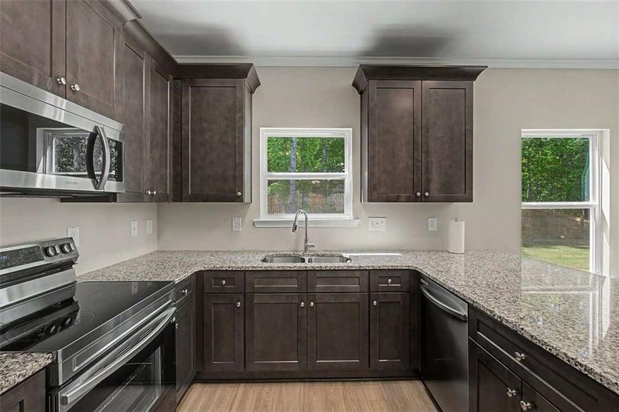 Furnished interior view inside a new home in Traditions at Cedarcrest, Dallas (Image 10).