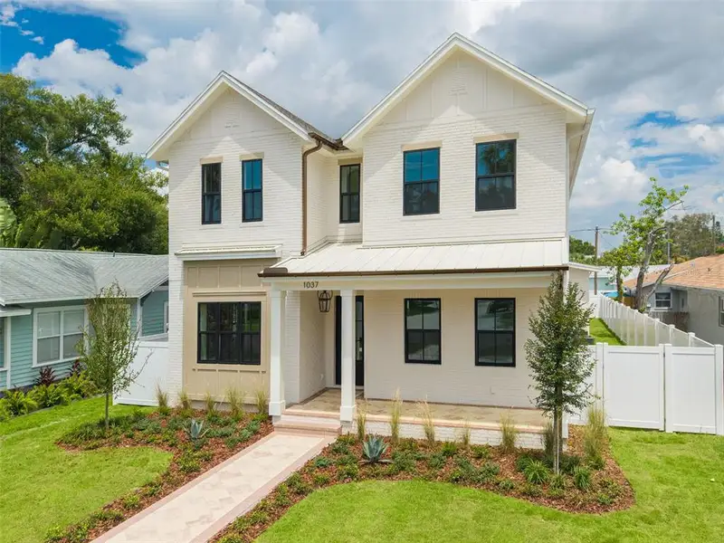 Front exterior of a new home in , St. Petersburg, FL, highlighting curb appeal (Image 27).