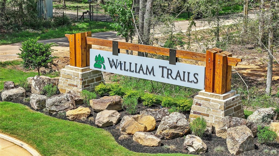 Entrance to the William Trails community in Willis, TX, featuring signage and landscaping (Image 2).