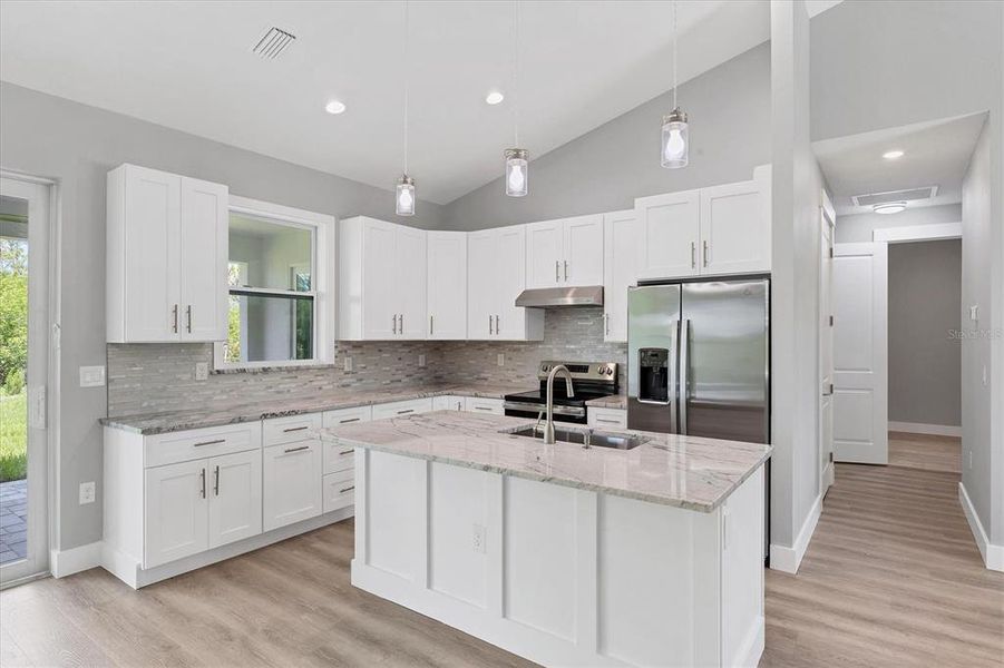 Furnished interior view inside a new home in , Port Charlotte (Image 5). Furnished interior view inside a new home in , Port Charlotte (Image 5).