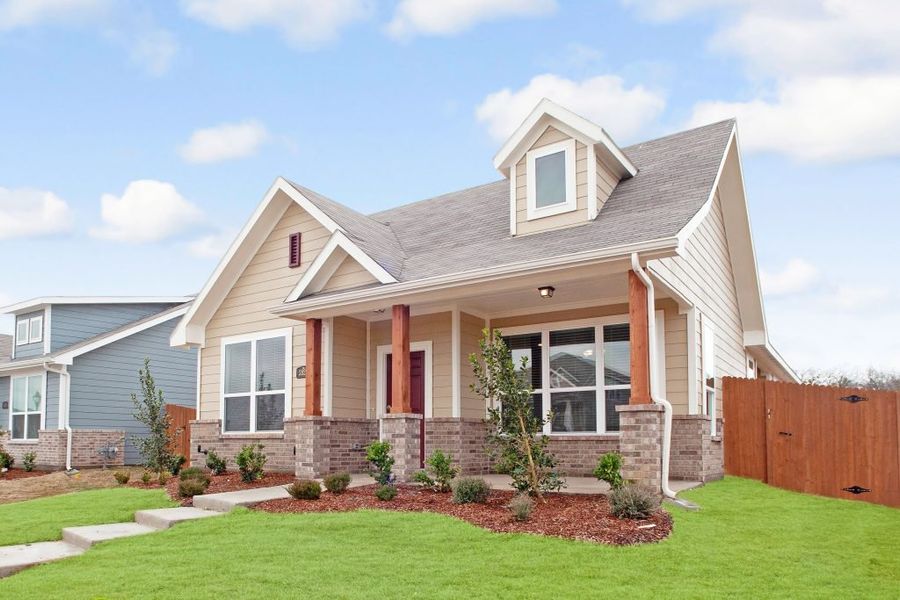 Representative exterior photo of a completed home built from the Wesley by Impression Homes in Heartland, Heartland, TX (Image 2). Representative exterior photo of a completed home built from the Wesley by Impression Homes in Heartland, Heartland, TX (Image 2).