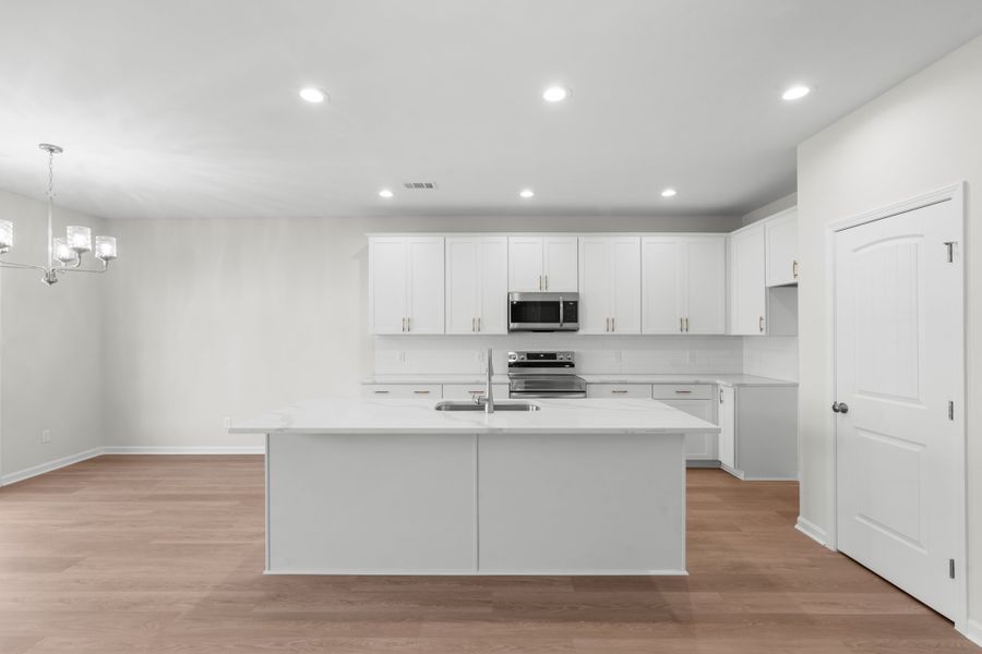 Furnished interior view inside a new home in McAllister Pointe, Richmond Hill (Image 6).