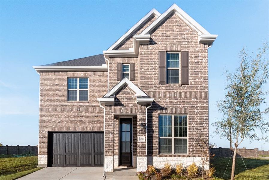 Front exterior of a new home in Sutton Fields, Celina, TX, highlighting curb appeal (Image 2).