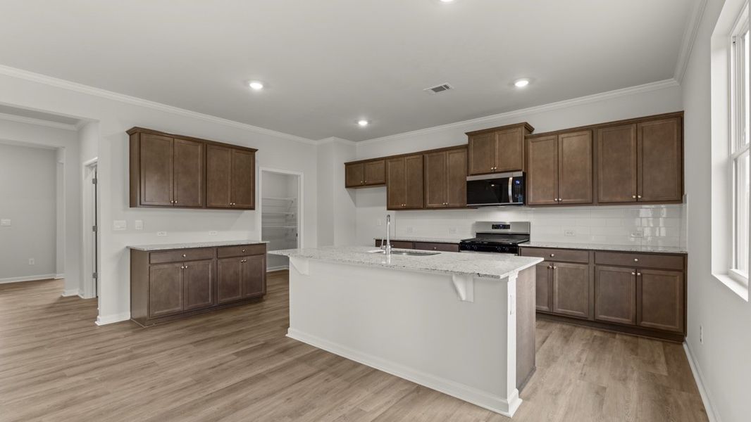 Representative furnished interior of a home built from the Green by D.R. Horton in Aurora Creek, Dallas (Image 6).