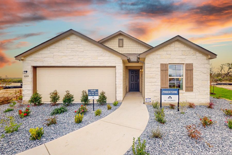 Front exterior of a new home in Agave, San Antonio, TX, highlighting curb appeal (Image 23).