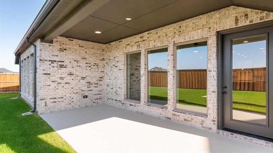 Exterior details and patio area of a home in Myrtle Creek 60', Waxahachie (Image 3).