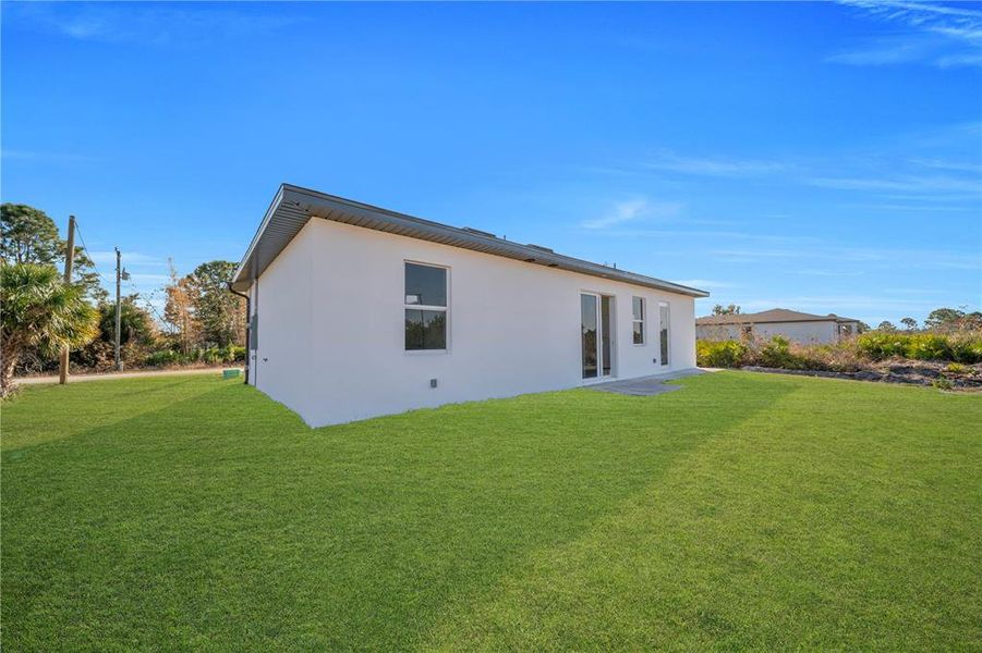 Exterior details and patio area of a home in , Lehigh Acres (Image 25).