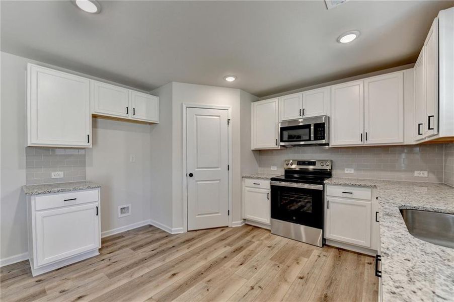 Furnished interior view inside a new home in , Auburn (Image 12). Furnished interior view inside a new home in , Auburn (Image 12).