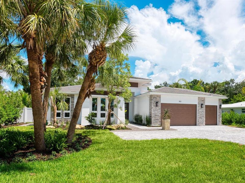 Front exterior of a new home in , Sarasota, FL, highlighting curb appeal (Image 35).