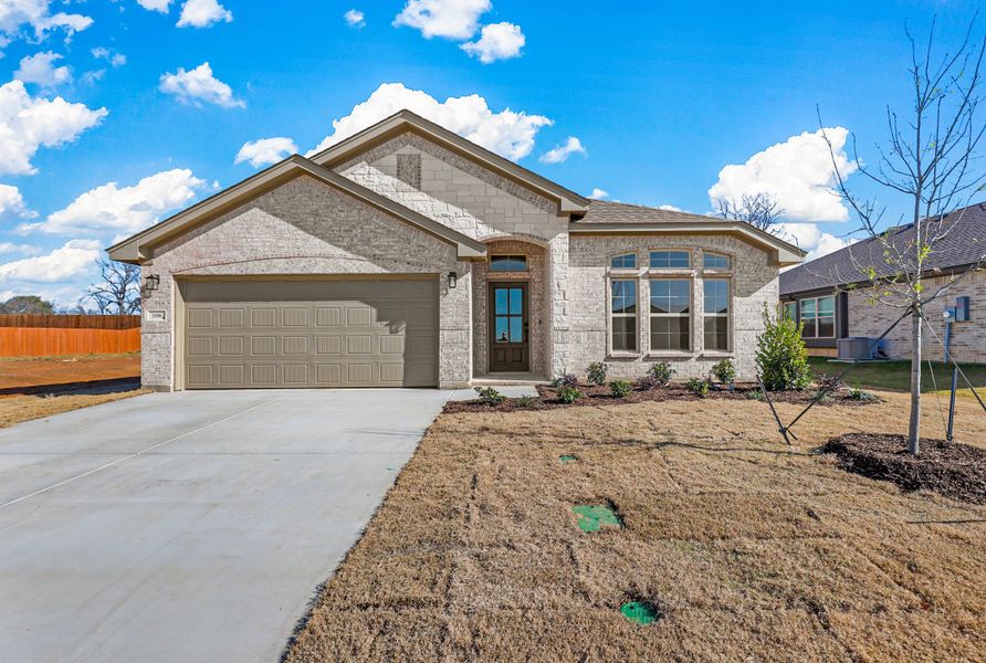 Representative exterior photo of a completed home built from the Sherwood by Cheldan Homes in Sunset Ridge, Keene, TX (Image 32). Representative exterior photo of a completed home built from the Sherwood by Cheldan Homes in Sunset Ridge, Keene, TX (Image 32).