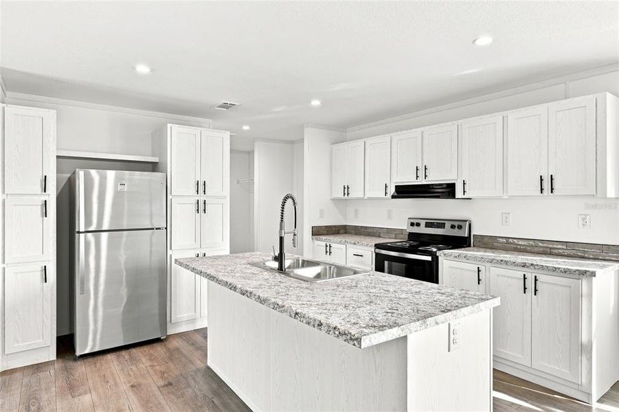 Furnished interior view inside a new home in , Okeechobee (Image 3).