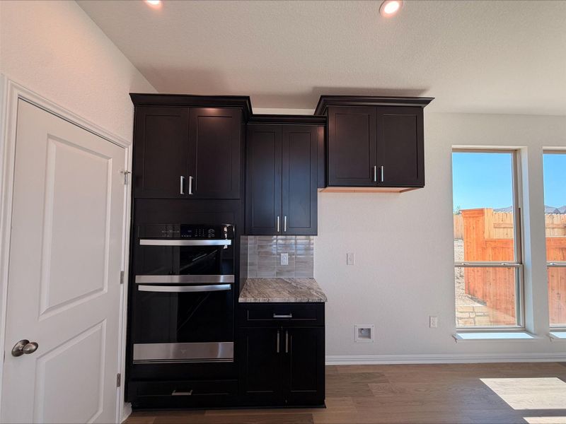 Furnished interior view inside a new home in Crosswinds, Kyle (Image 7).