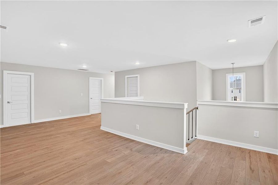 Spacious, unfurnished interior of a new home in The Fairways at Mirror Lake, Villa Rica (Image 29).