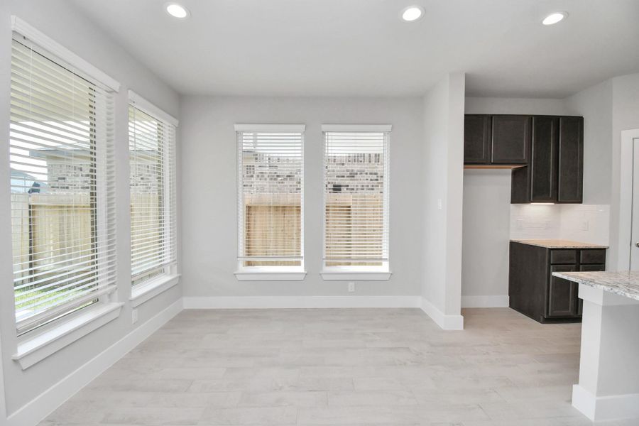Make memories gathered around the table with your family and friends! This spacious dining room features elegant flooring, custom paint, and adjacent to family room and kitchen for open concept feel. Make memories gathered around the table with your family and friends! This spacious dining room features elegant flooring, custom paint, and adjacent to family room and kitchen for open concept feel.