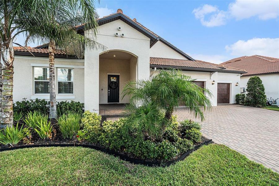 Front exterior of a new home in , Wimauma, FL, highlighting curb appeal (Image 1).